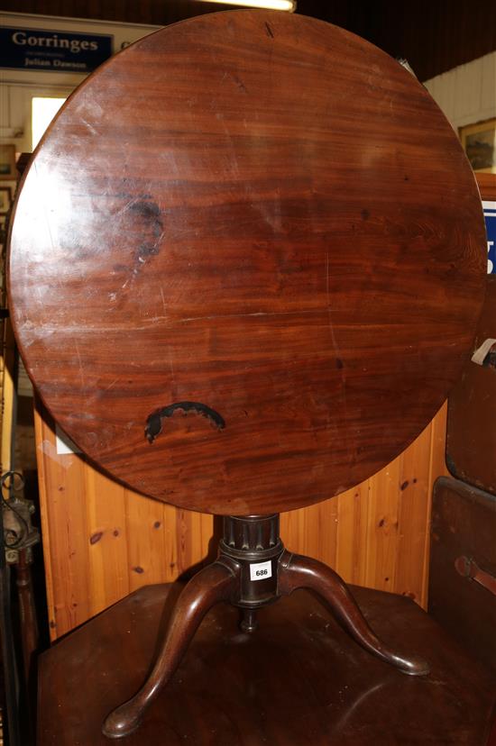 A George III circular mahogany tea table